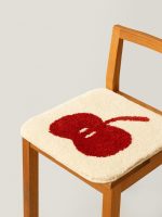 Rounded square orchard-themed chair cushion